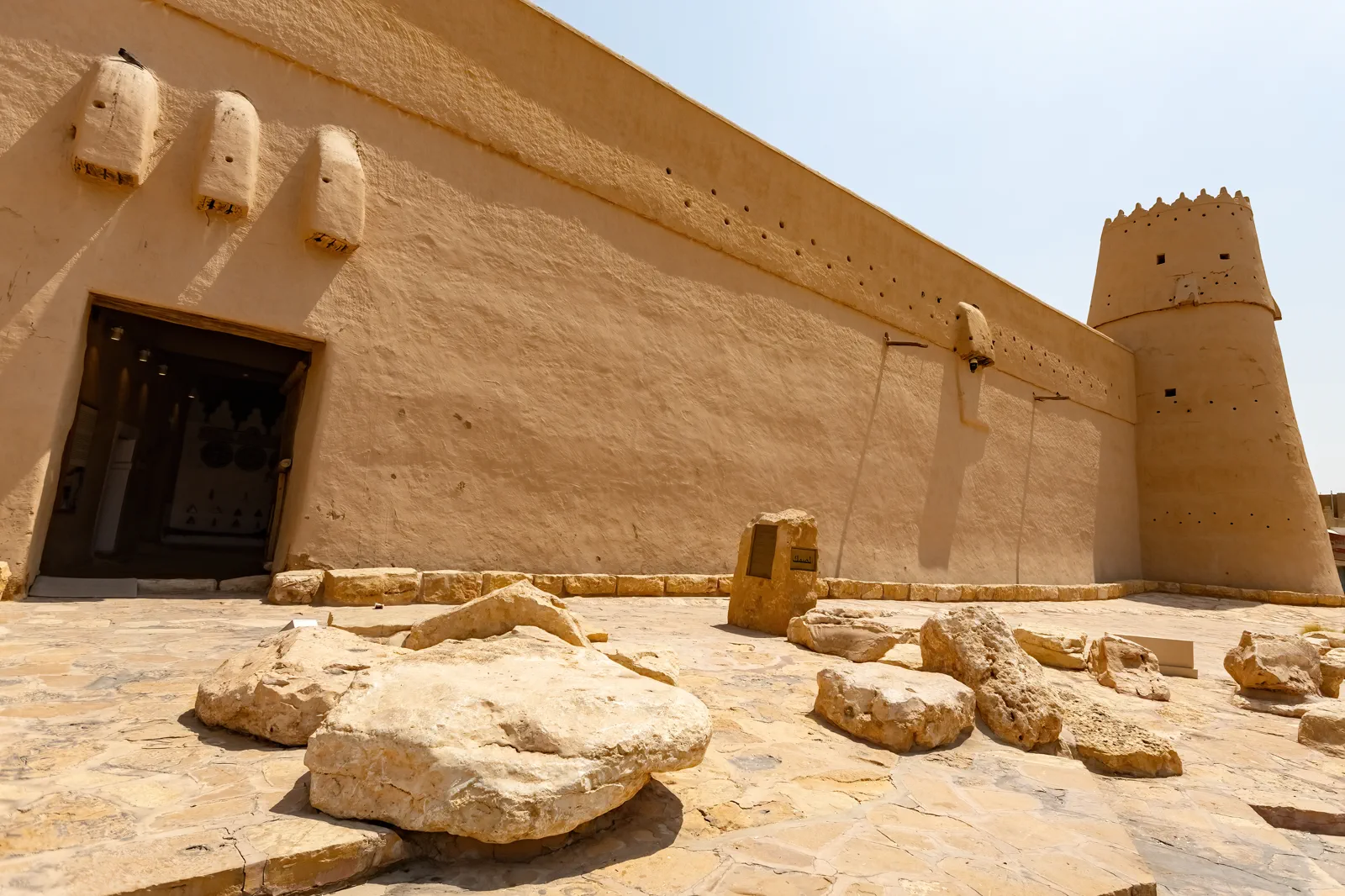 Low-angle view of Al-Masmak Palace mud-brick wall and tower, Riyadh